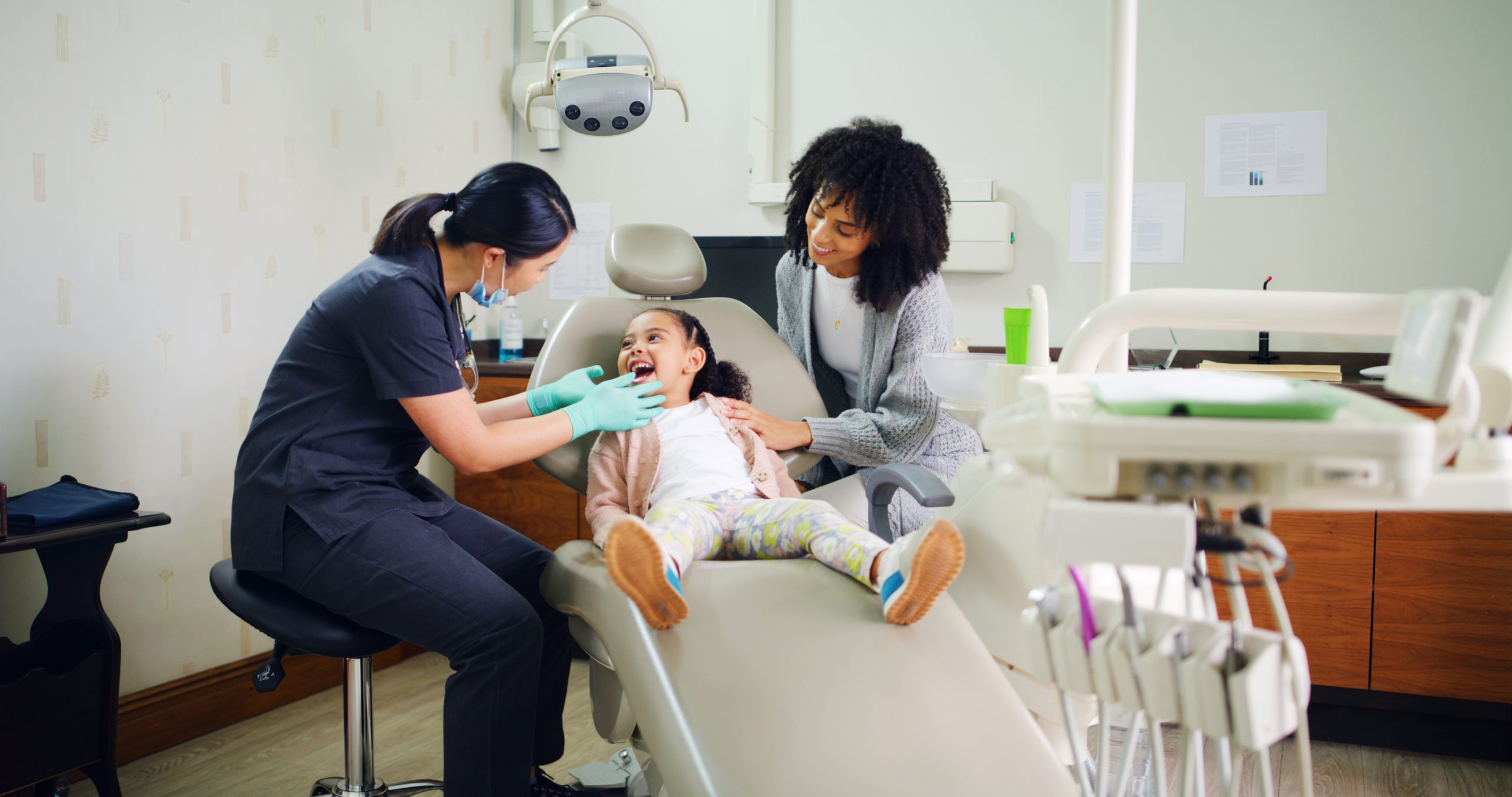 dentist-mother-and-girl-with-teeth-inspection-for-2026-06-01-18-44-01-utc